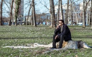 A lone man sits on a tree stump alone in a park. Treatment for narcissism in Greenwood Village, CO can offer support in overcoming narcissism. A therapist for narcissism in Greenwood Village, CO can offer narcissist therapy online in Greenwood Village, CO and more.